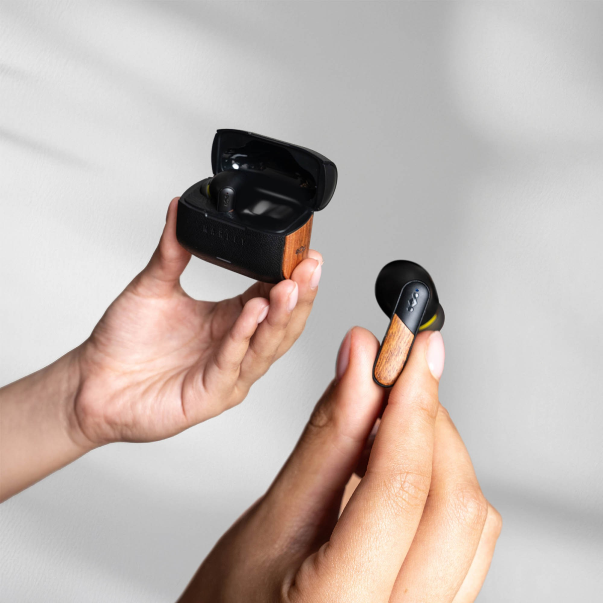 The House of Marley Trenchtown ANC Wireless Earbuds deliver immersive noise-cancelling sound and up to 24 hours of playtime, crafted from renewable bamboo and recycled plastics for sustainable listening.