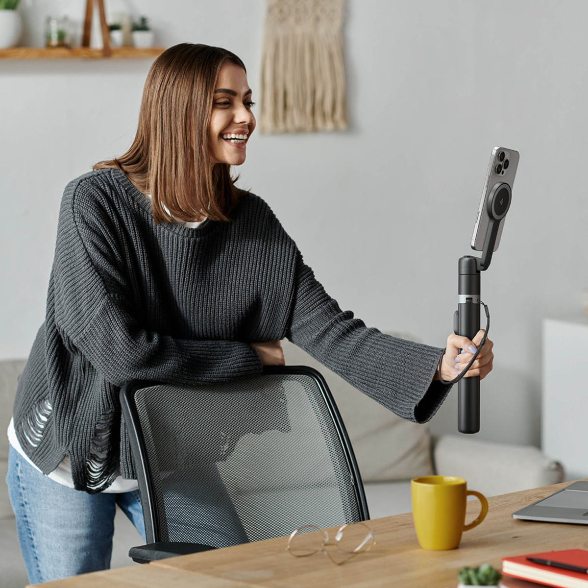 The Spigen Tripod MagFit Selfie Stick combines magnetic mounting, auto-opening tripod, and Bluetooth control for stable, extended, hands-free shooting.