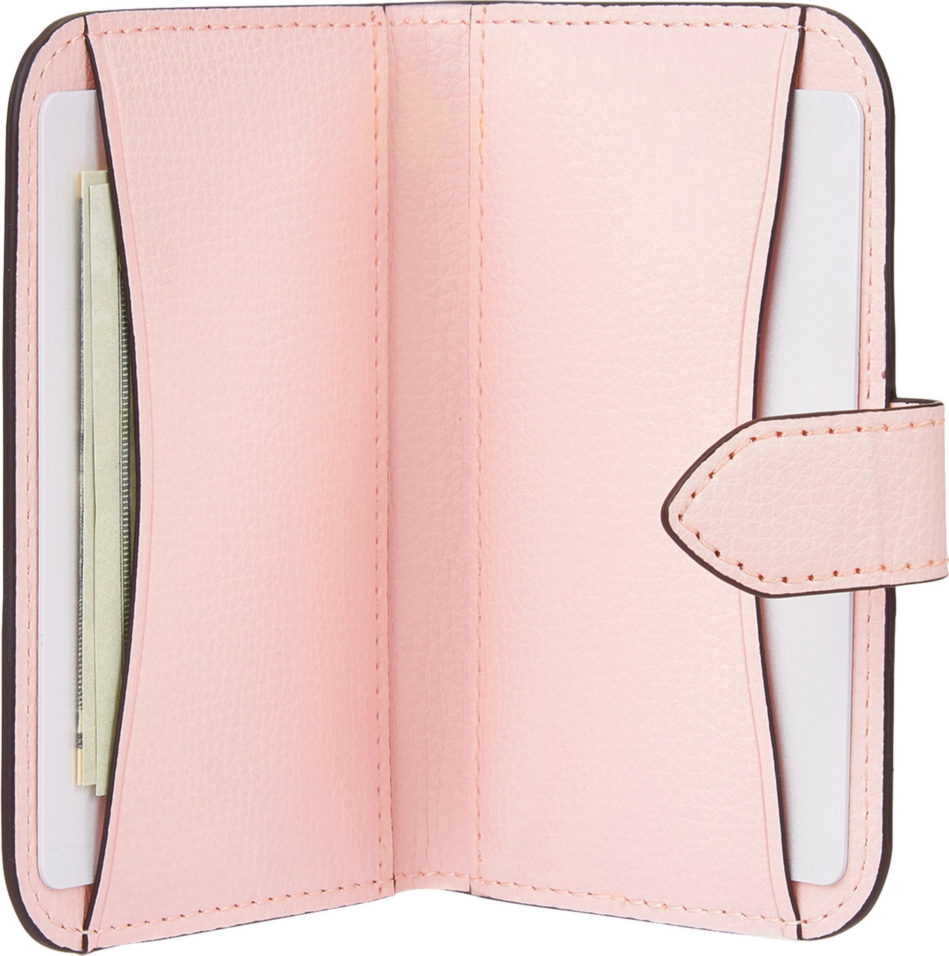 <p>The Kate Spade Morgan Magnetic Wallet uses strong built-in magnets to securely attach the wallet to MagSafe compatible phones.</p>